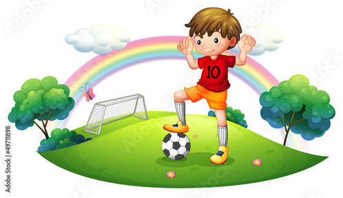A boy in a soccer field
