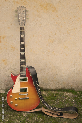 vintage guitar and wall photo