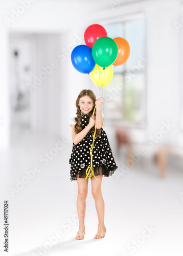 happy girl with colorful balloons © Syda Productions