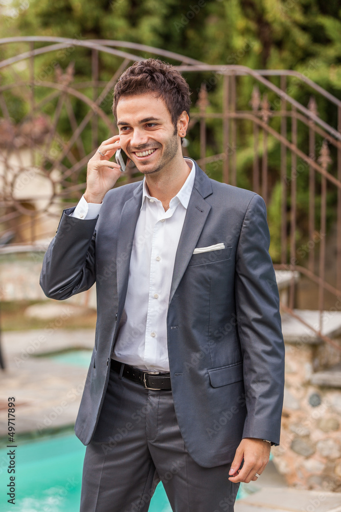 Young Businessman with Mobile Phone Young Businessman with Mobile Phone