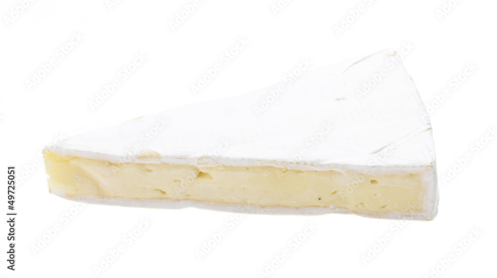 A piece of soft brie cheese