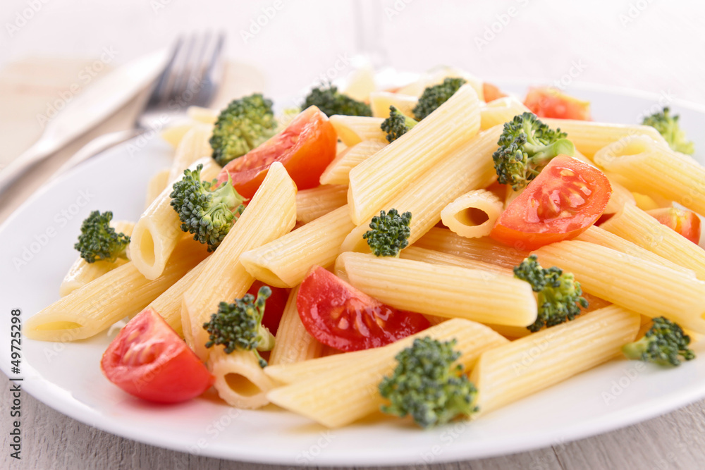 plate of pasta with tomato and broccoli plate of pasta with tomato and broccoli