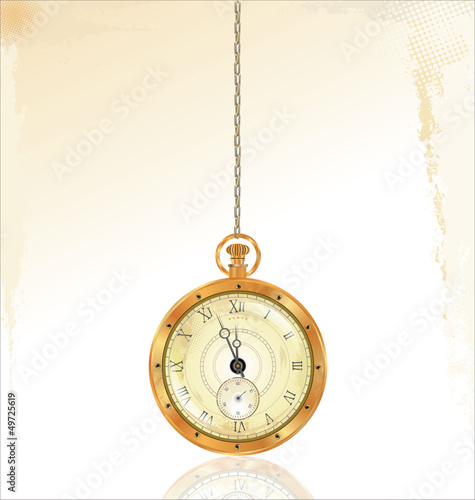 Old pocket watch on golden chain