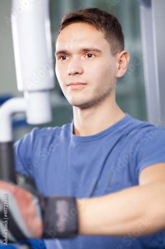 Portrait of a trainer in a fitness center
