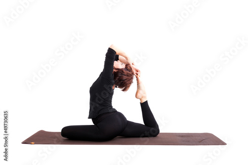 Woman performing yoga exercises