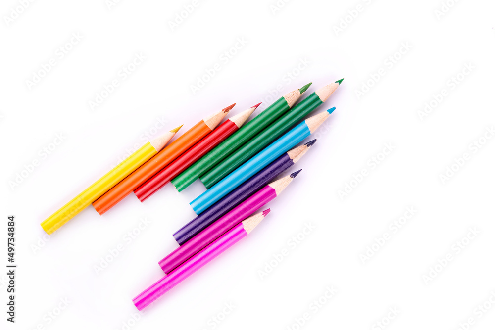 Colour pencils forming an arrow