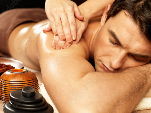 Man having massage in the spa salon