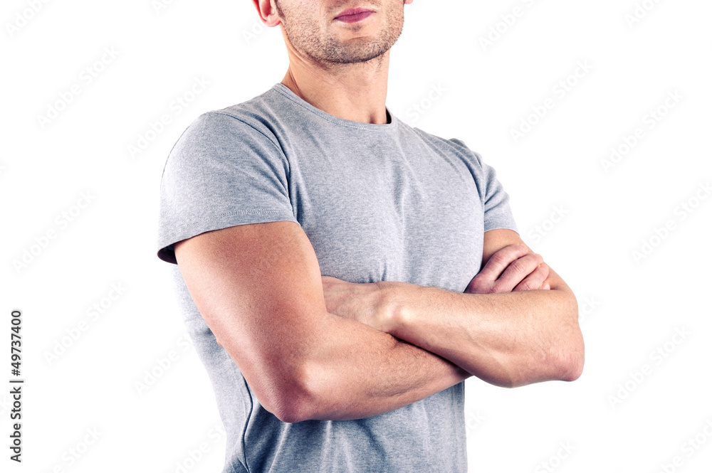 Foto Stock Crossed arms close up of muscular man on white background. |  Adobe Stock