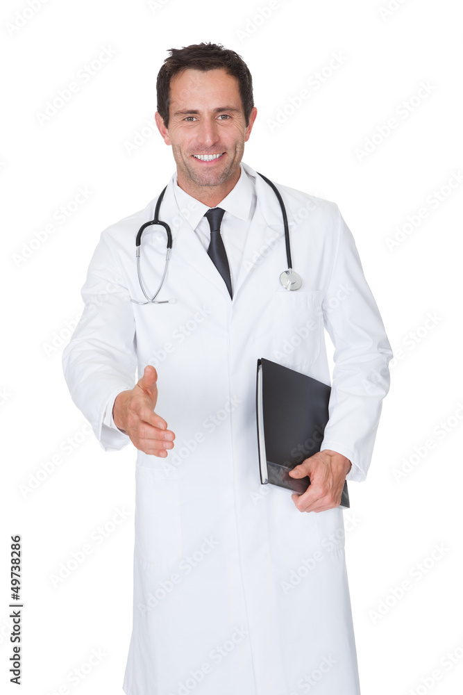 Portrait of friendly doctor offering handshake Portrait of friendly doctor offering handshake