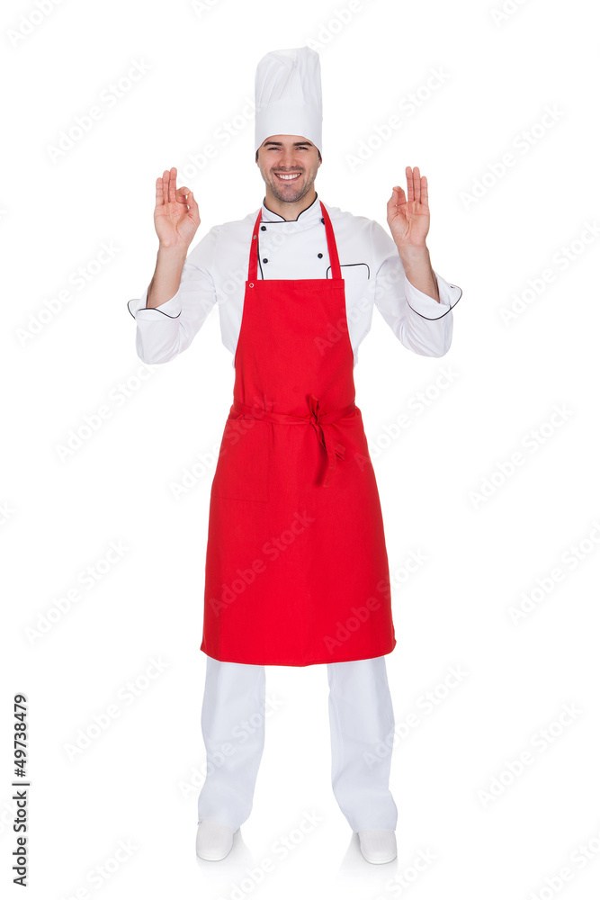 Portrait of cheerful chef in uniform Portrait of cheerful chef in uniform