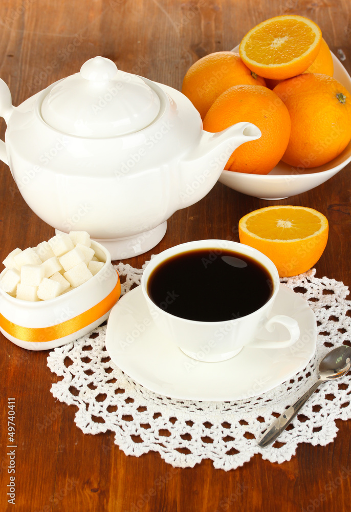 Beautiful white dinner service with oranges Beautiful white dinner service with oranges