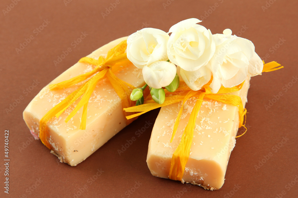Natural handmade soap, on brown background Natural handmade soap, on brown background