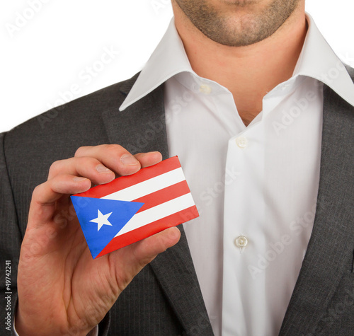 Businessman is holding a business card, Puerto RIco photo