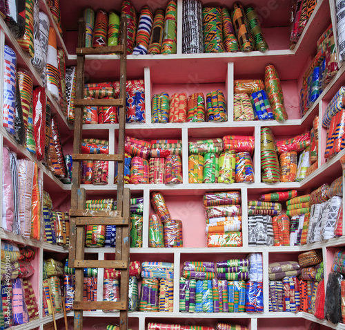 Kente cloth for sale at the market © guppyimages