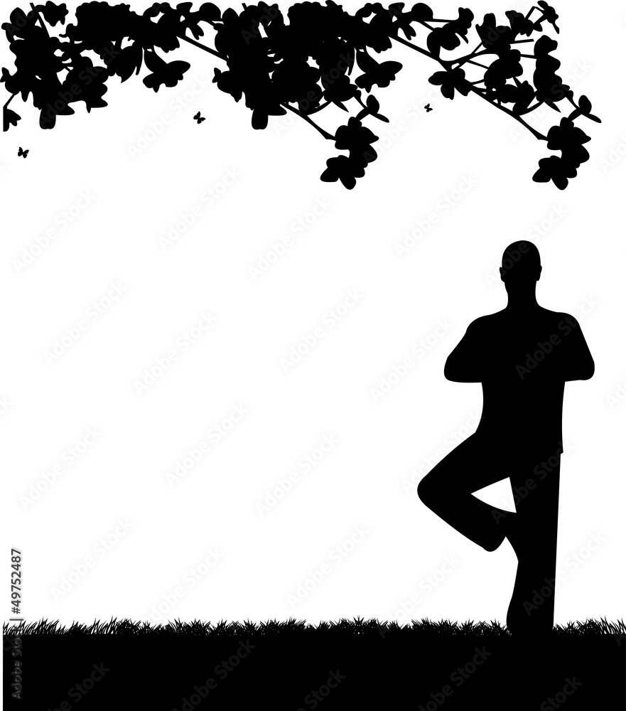 An isolated man meditating and doing yoga exercise An isolated man meditating and doing yoga exercise