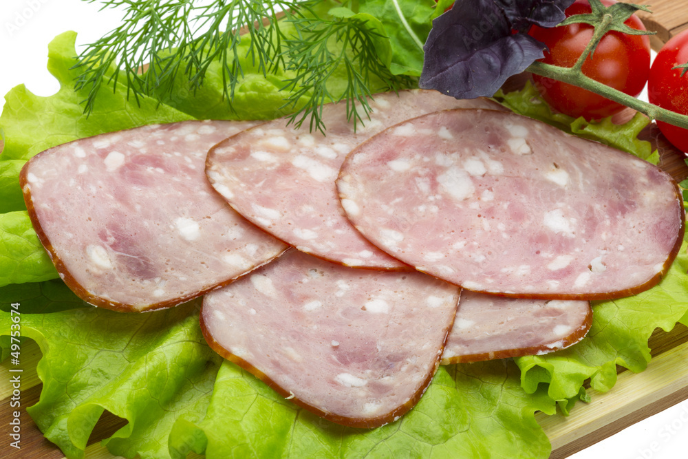 Sausages with salad and basil Sausages with salad and basil