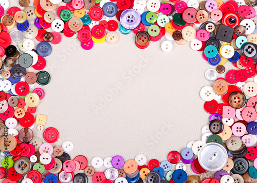 multi colored buttons on fabric