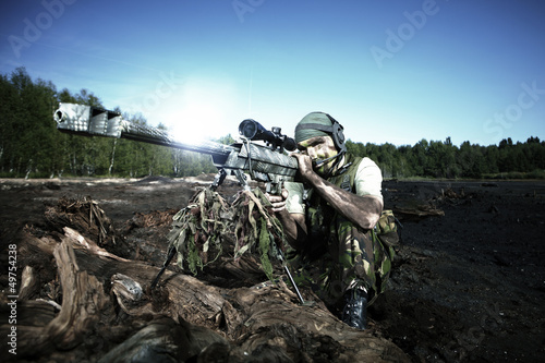 Special forces soldier with sniper rifle barrett m99