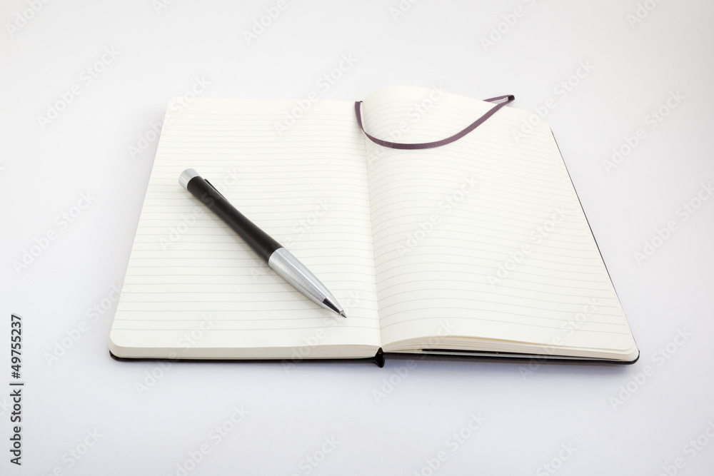 Notebook and pen on white Notebook and pen on white