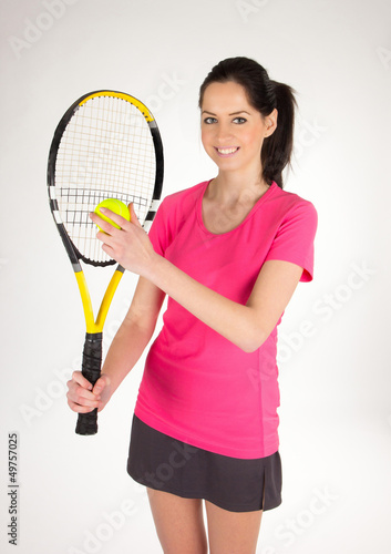 Portrait of young woman with tennis racket © Lukas Gojda