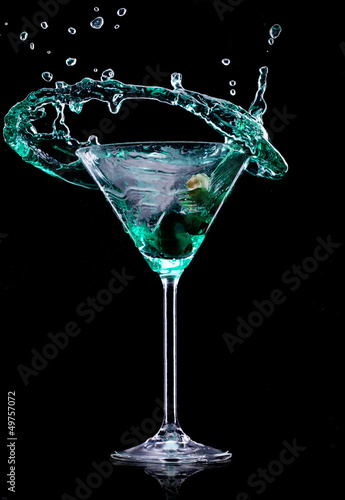 Martini drink over dark bac...