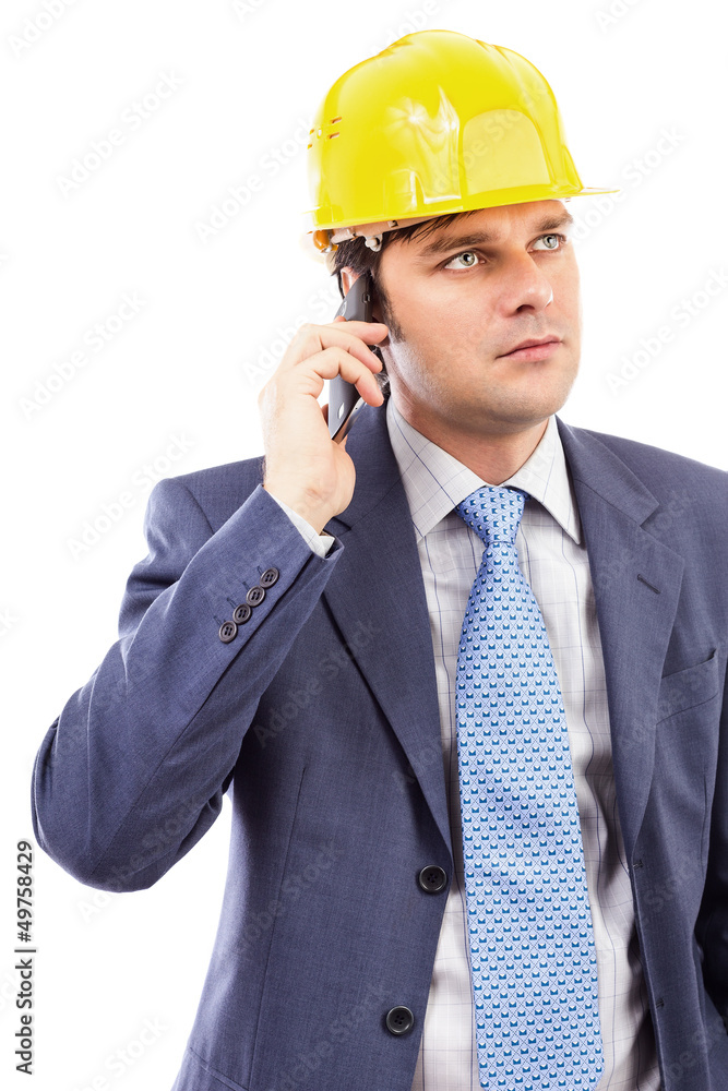 Portrait of a young engineer talking on the phone Portrait of a young engineer talking on the phone