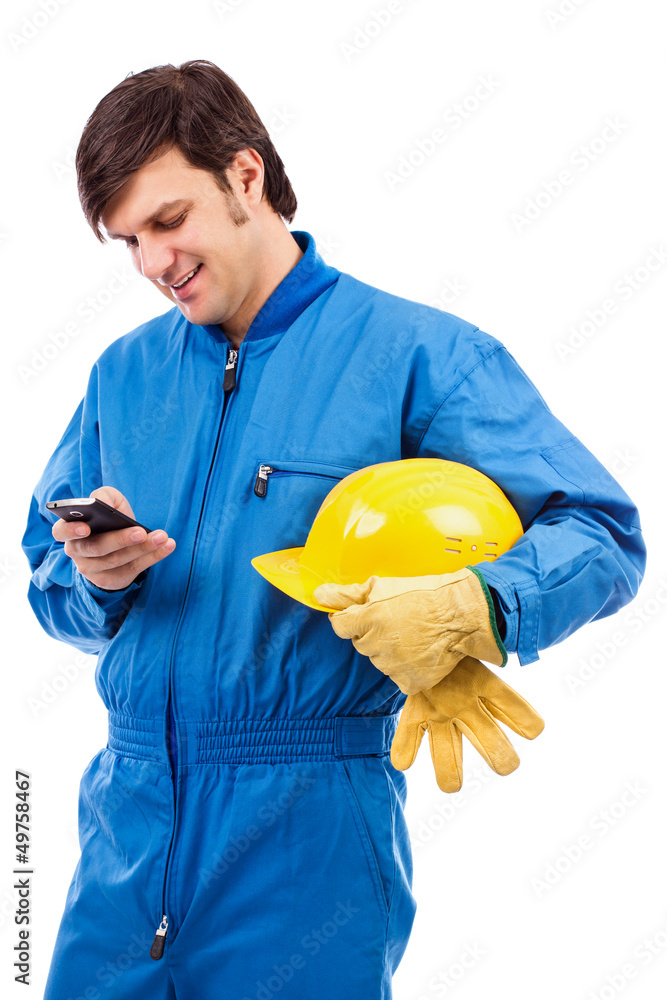 Portrait of a young worker using mobile phone Portrait of a young worker using mobile phone