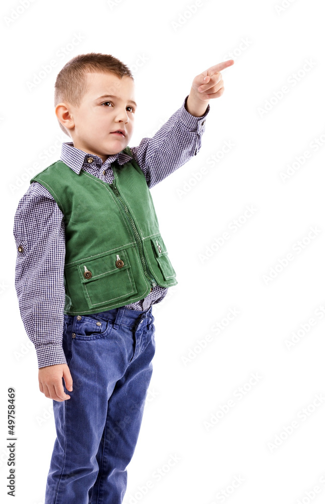 Portrait of a little boy pointing up
