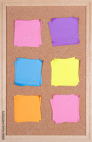 sticky notes on a bulletin board