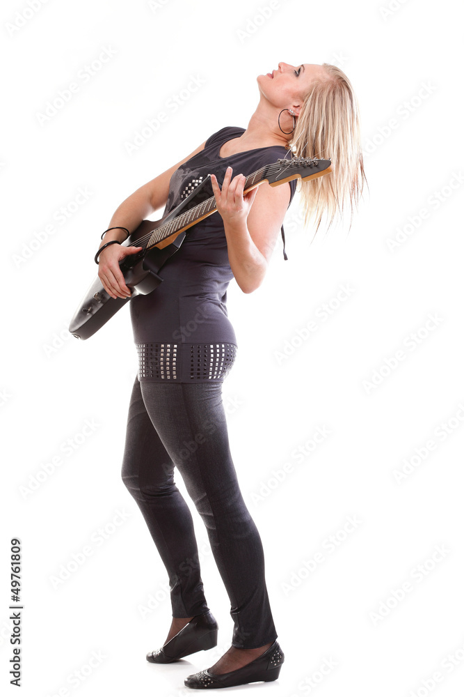 Woman with black guitar looking isolated Woman with black guitar looking isolated