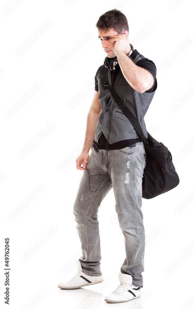 Full length portrait school boy talking phone Full length portrait school boy talking phone