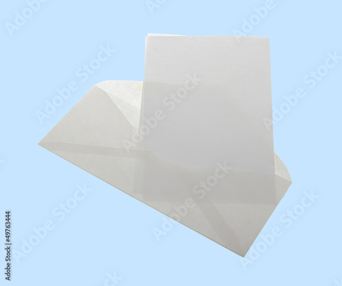 Sheet of white paper sticking out of postal envelop.