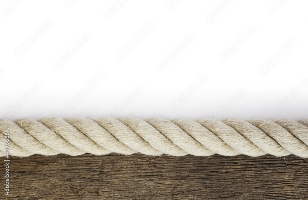 Obraz premium Starkes Tau auf verwittertem Holz
