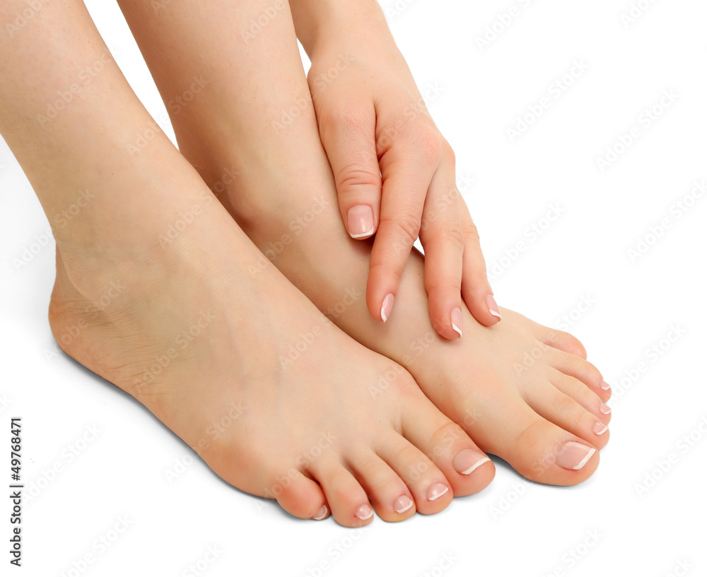 Beautiful woman legs and hand, isolated on white Beautiful woman legs and hand, isolated on white