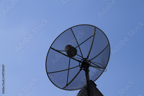 Satellite dish against the blue sky