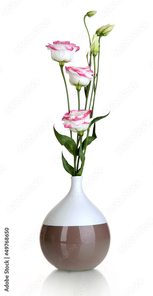 Bouquet of eustoma flowers in vase isolated on white Bouquet of eustoma flowers in vase isolated on white