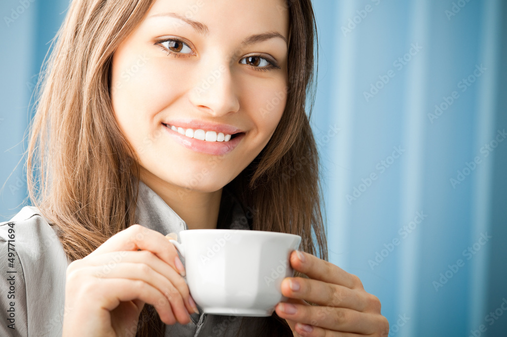Cheerful smiling business woman with coffee Cheerful smiling business woman with coffee