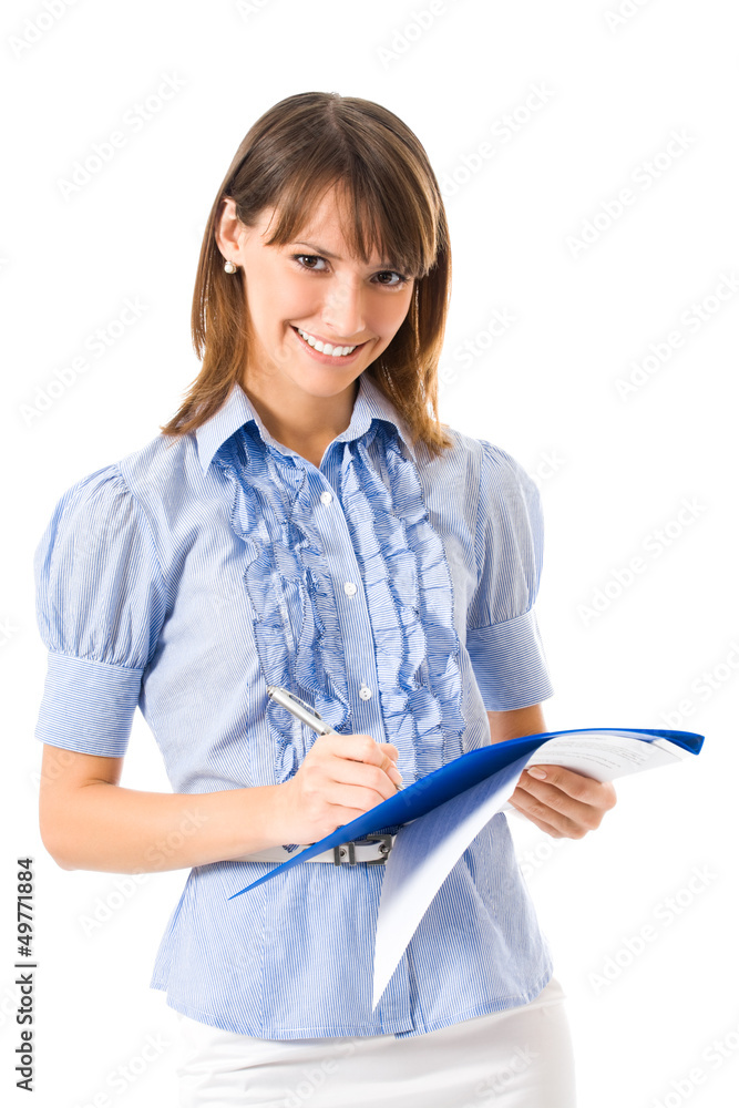 Businesswoman writing on documents, isolated Businesswoman writing on documents, isolated