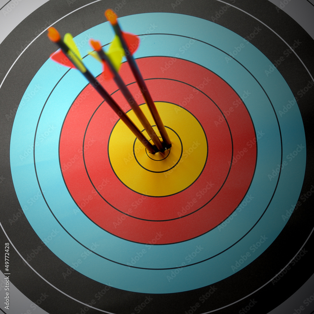 Arrow hit goal ring in archery target Arrow hit goal ring in archery target