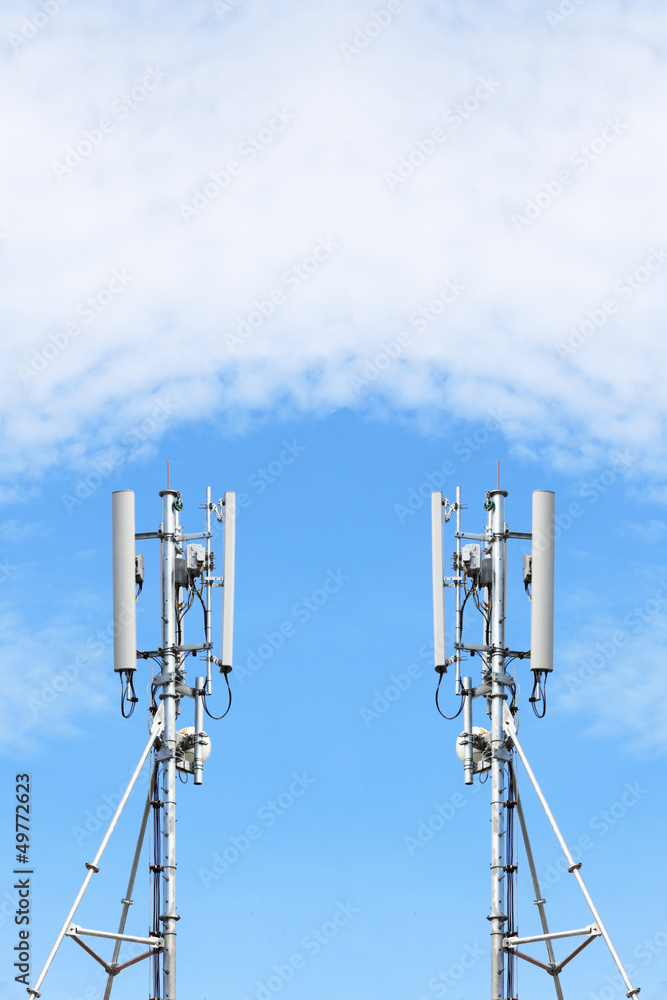 communications tower with antennas against blue sky communications tower with antennas against blue sky
