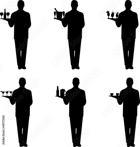 Beautiful young waiter standing and holding a round tray