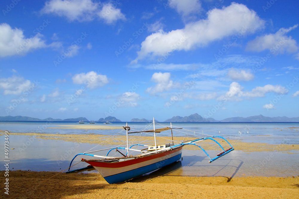 Naklejka premium Boats at Corong corong beach. El Nido
