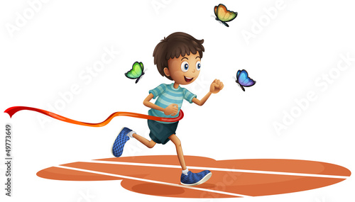 A boy running with three butterflies