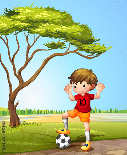 A boy with a soccer ball