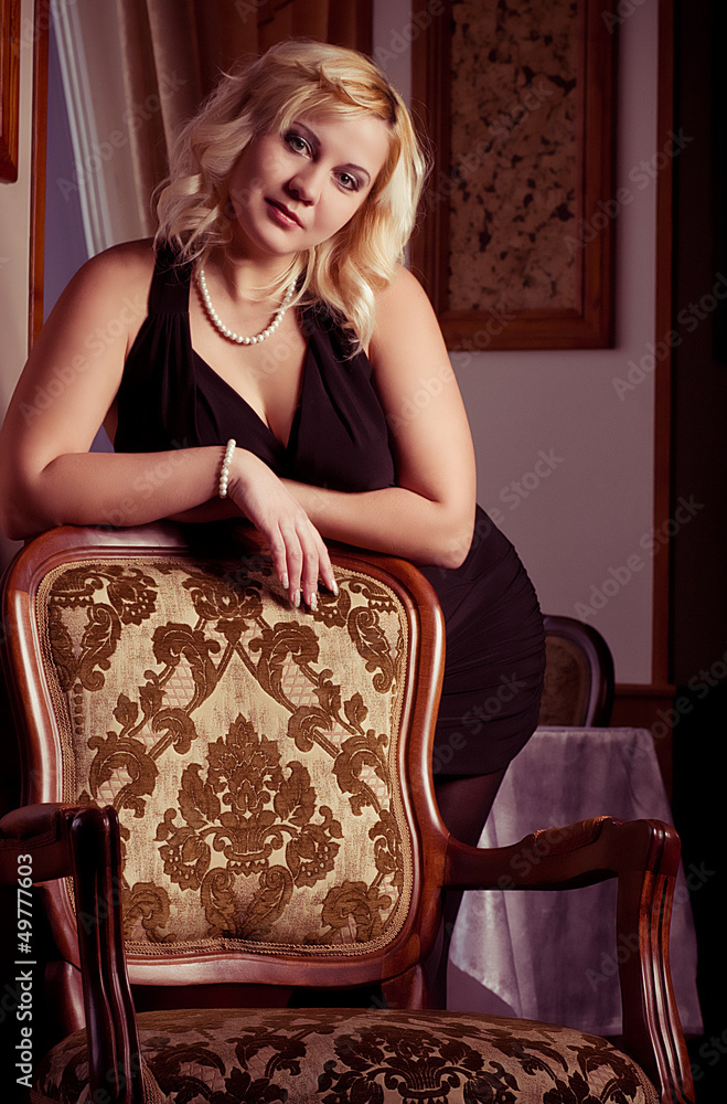 portrait of beautiful plus size young blond woman posing portrait of beautiful plus size young blond woman posing
