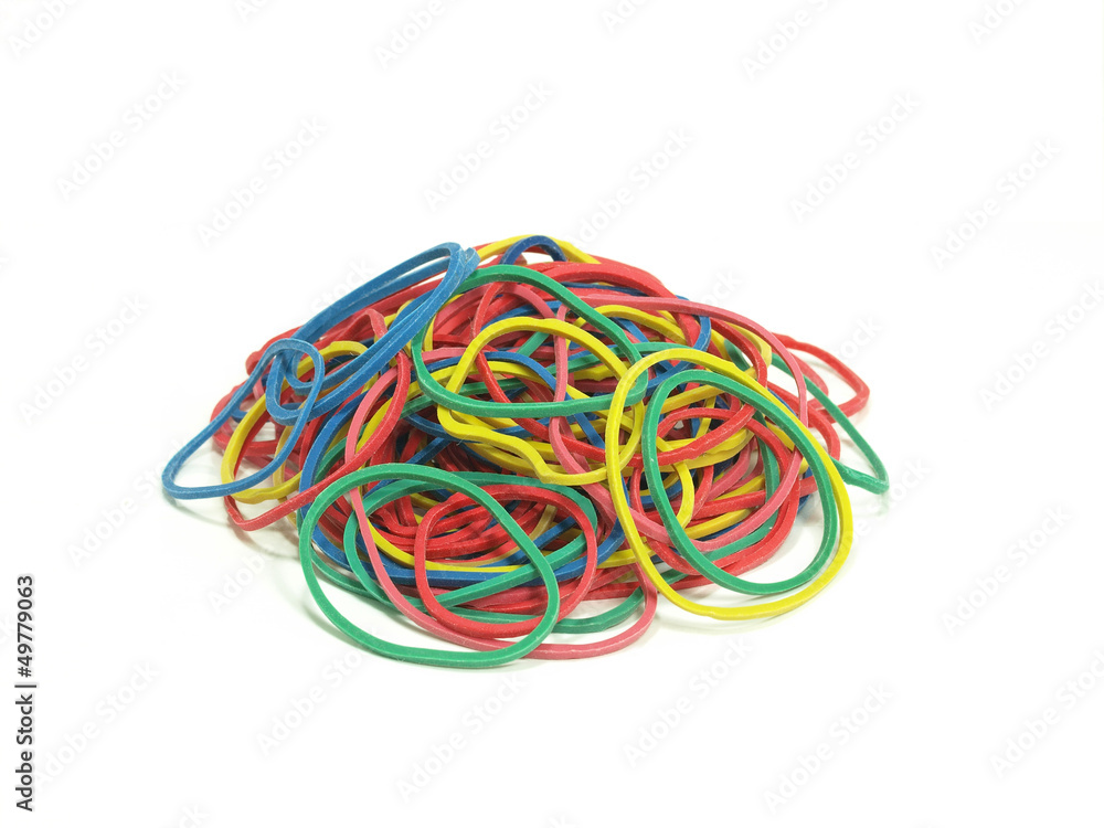 pile of colorful rubber bands on white background pile of colorful rubber bands on white background
