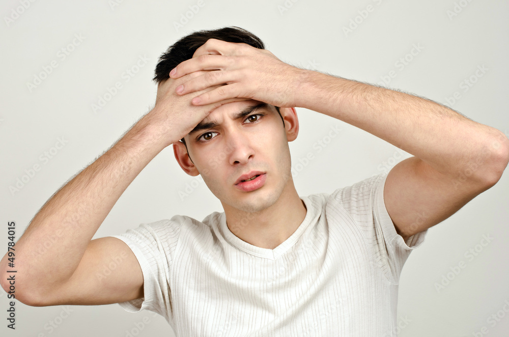 Worry, sadness, desperation.Man frowning with worry Worry, sadness, desperation.Man frowning with worry