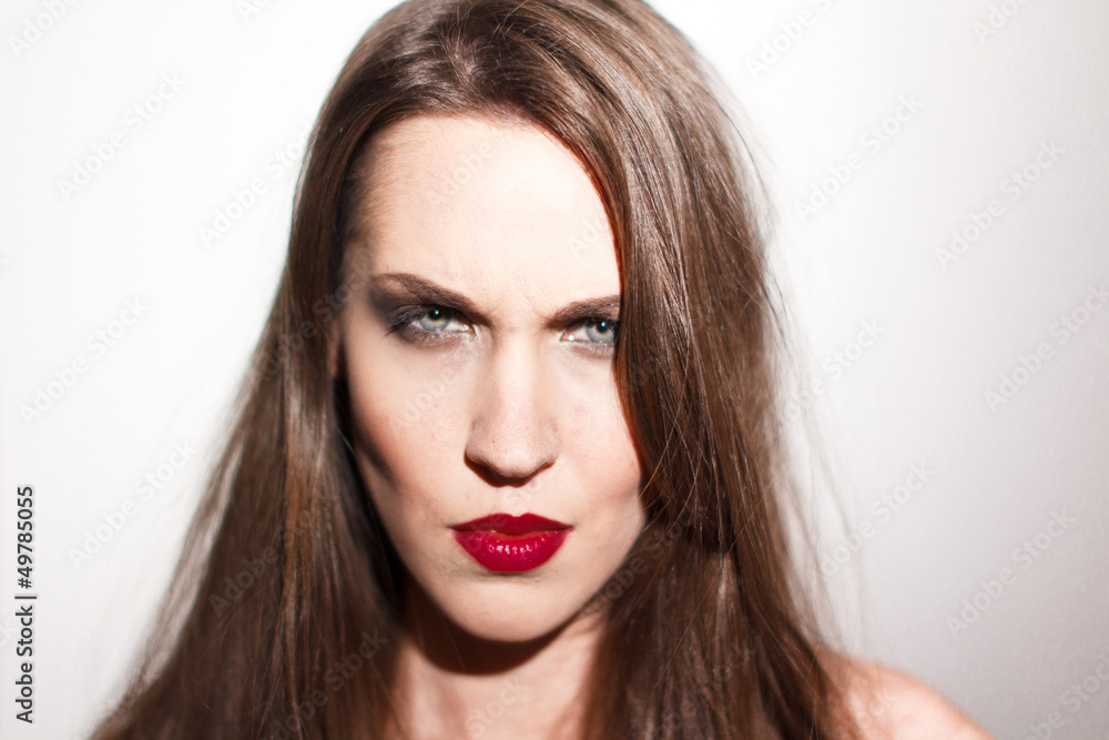 Attractive brunette woman angry portrait Attractive brunette woman angry portrait