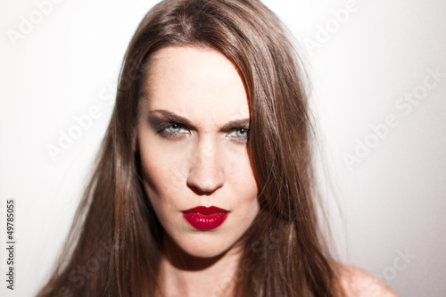 Attractive brunette woman angry portrait