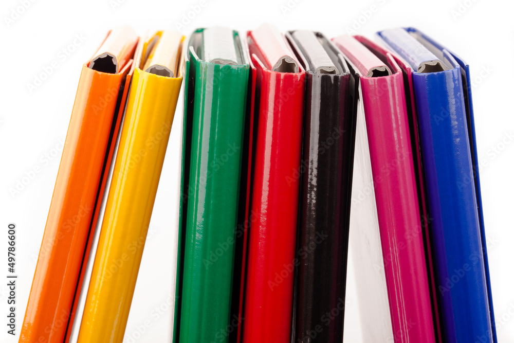 Fototapeta premium colorful office folders isolated on white